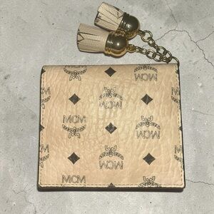MCM Beige Monogram Tassel Compact Wallet